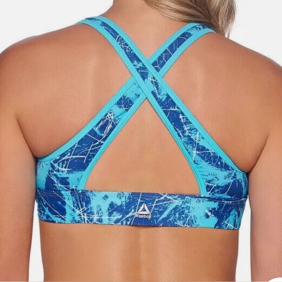 Reebok Woman's Sports Bra Size in Photos Blue Marble
High Neck Feminine Sporty - Picture 2 of 7